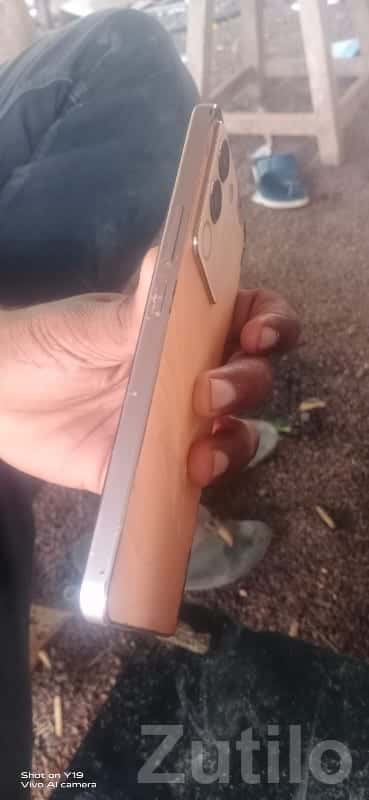 Vivo smartphone with triple camera gold