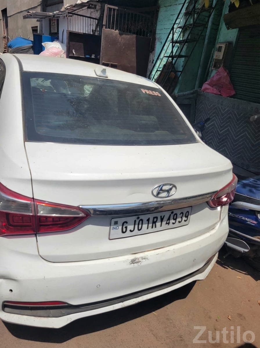 White Compact Sedan with Alloys image 2