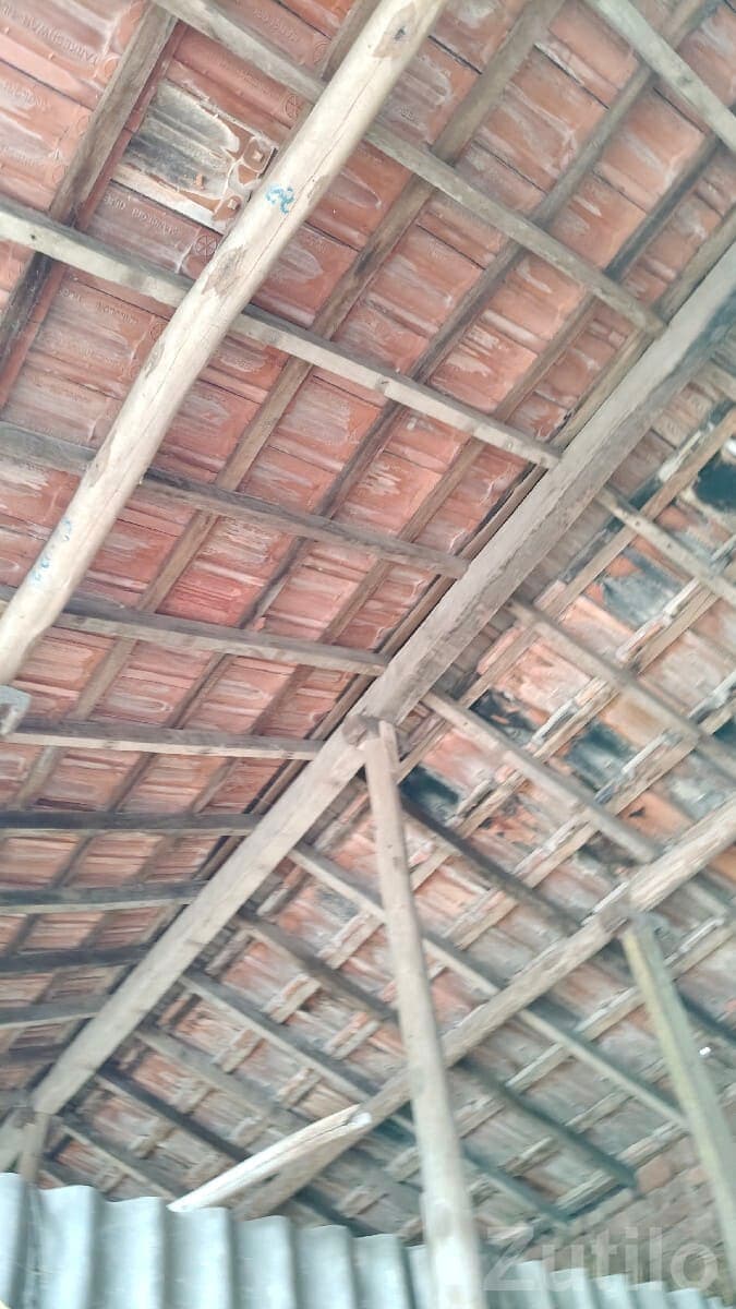 Old Roof Tiles and Wooden Beams Scrap