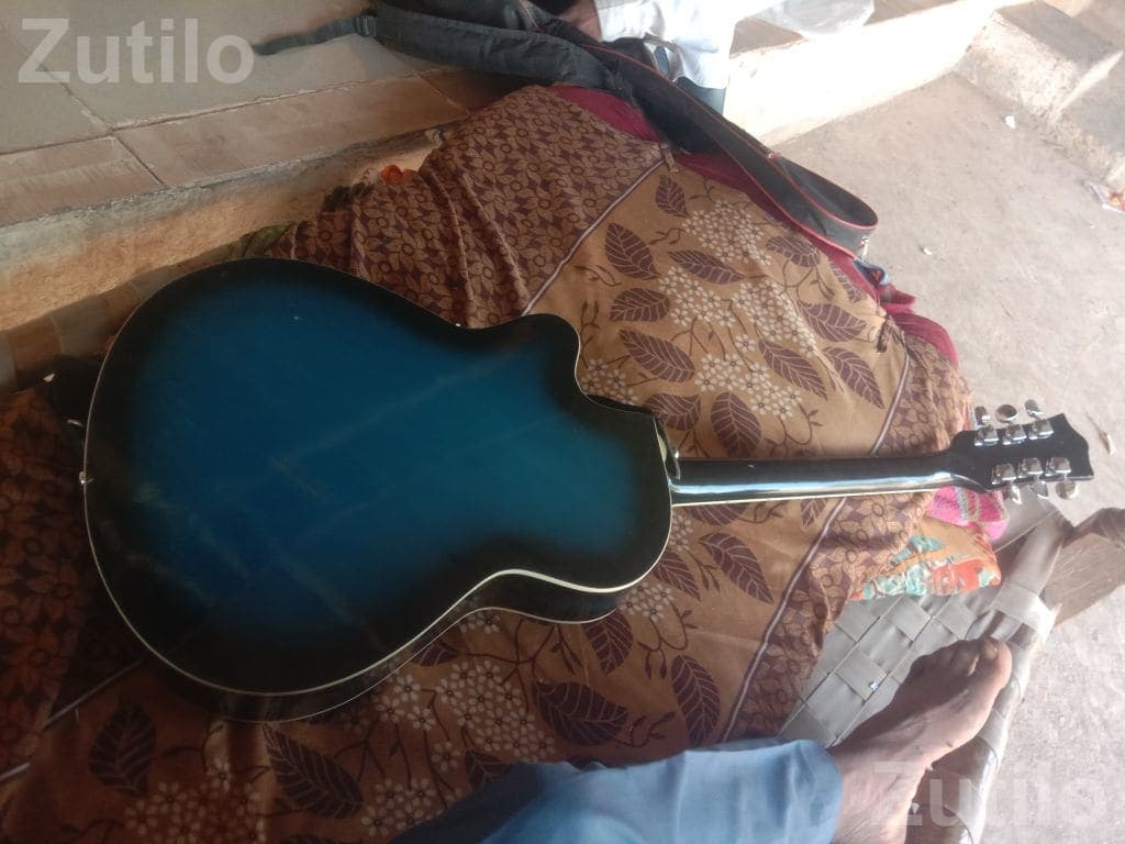 Blue Acoustic Guitar with Bag