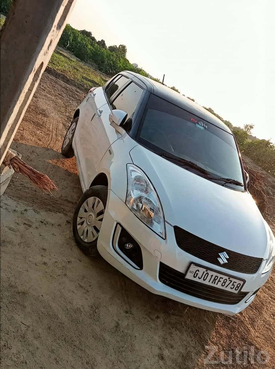 White Maruti Suzuki Swift DZire, Owner 2 White Maruti Suzuki Swift DZire, Owner 2