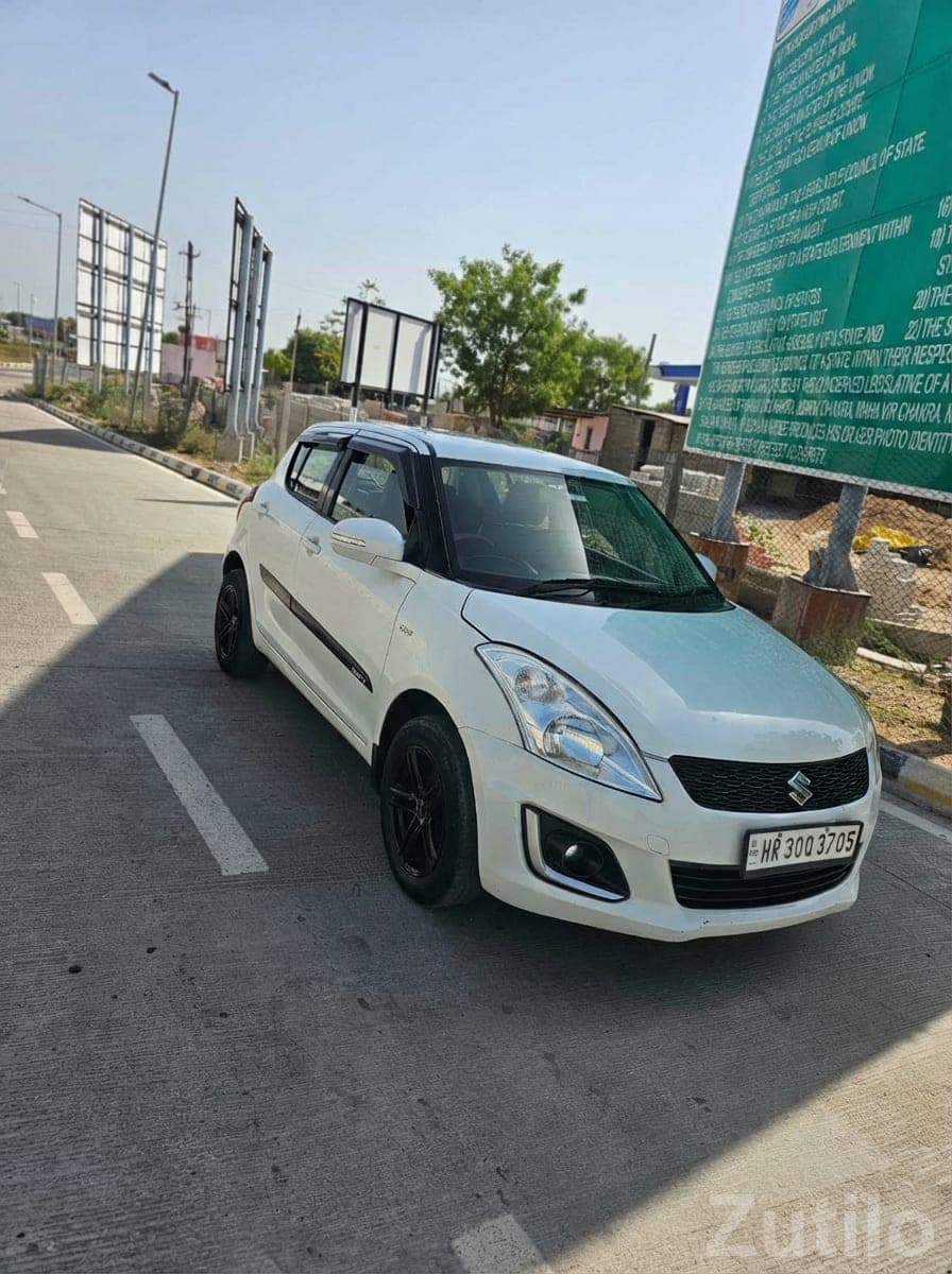 Maruti Swift VDI Diesel – White Hatchback