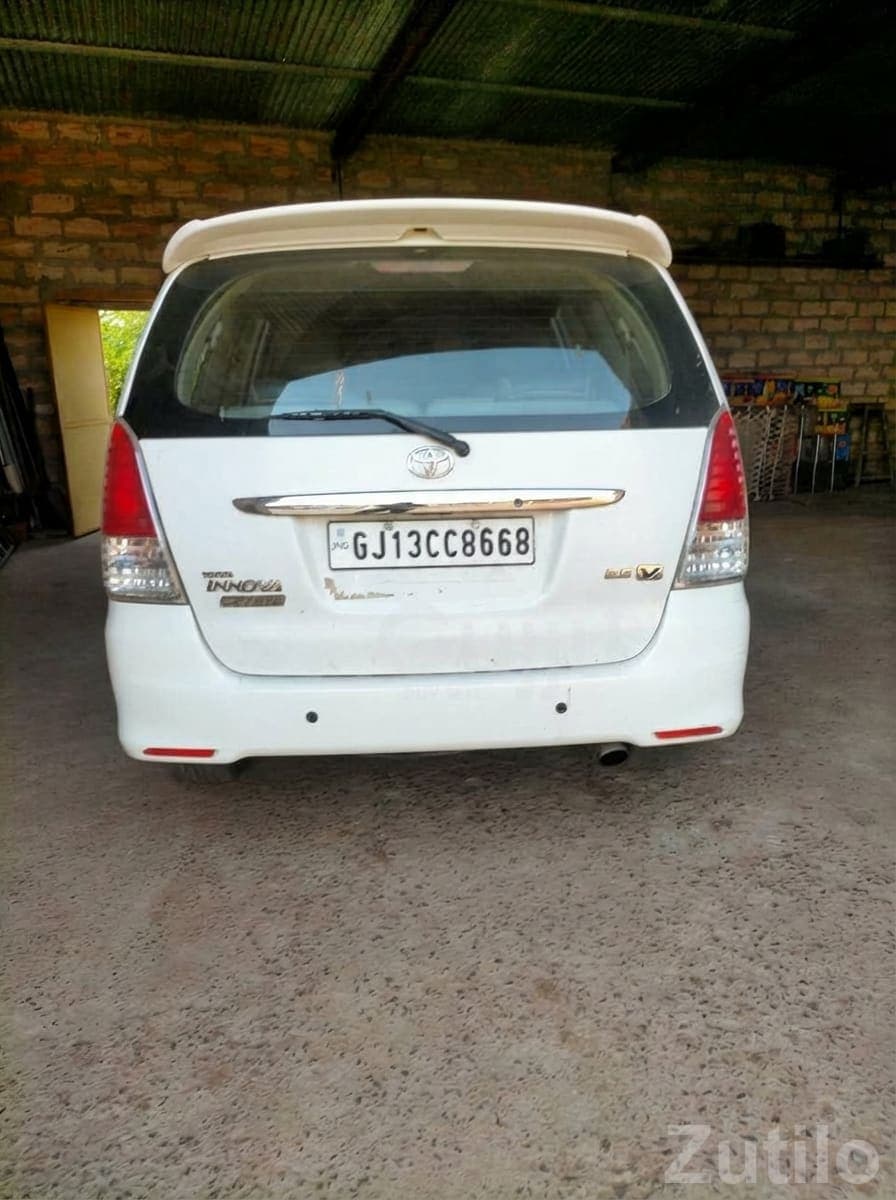 White Toyota Innova MPV with Spoiler