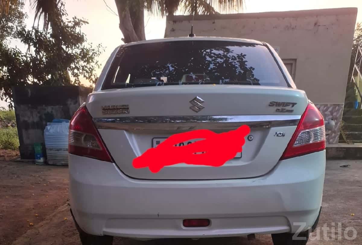 Maruti Swift Dzire VDi White Sedan Maruti Swift Dzire VDi White Sedan