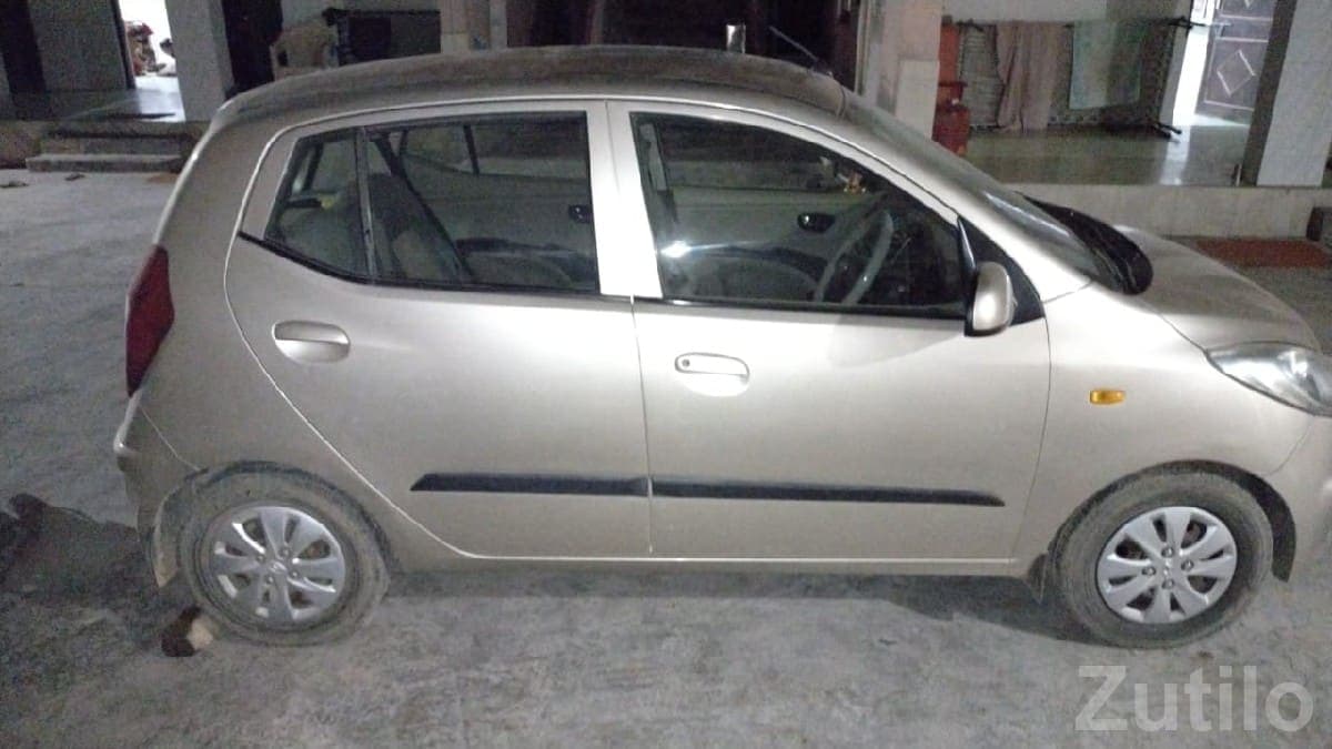 Beige Small Family Hatchback Car