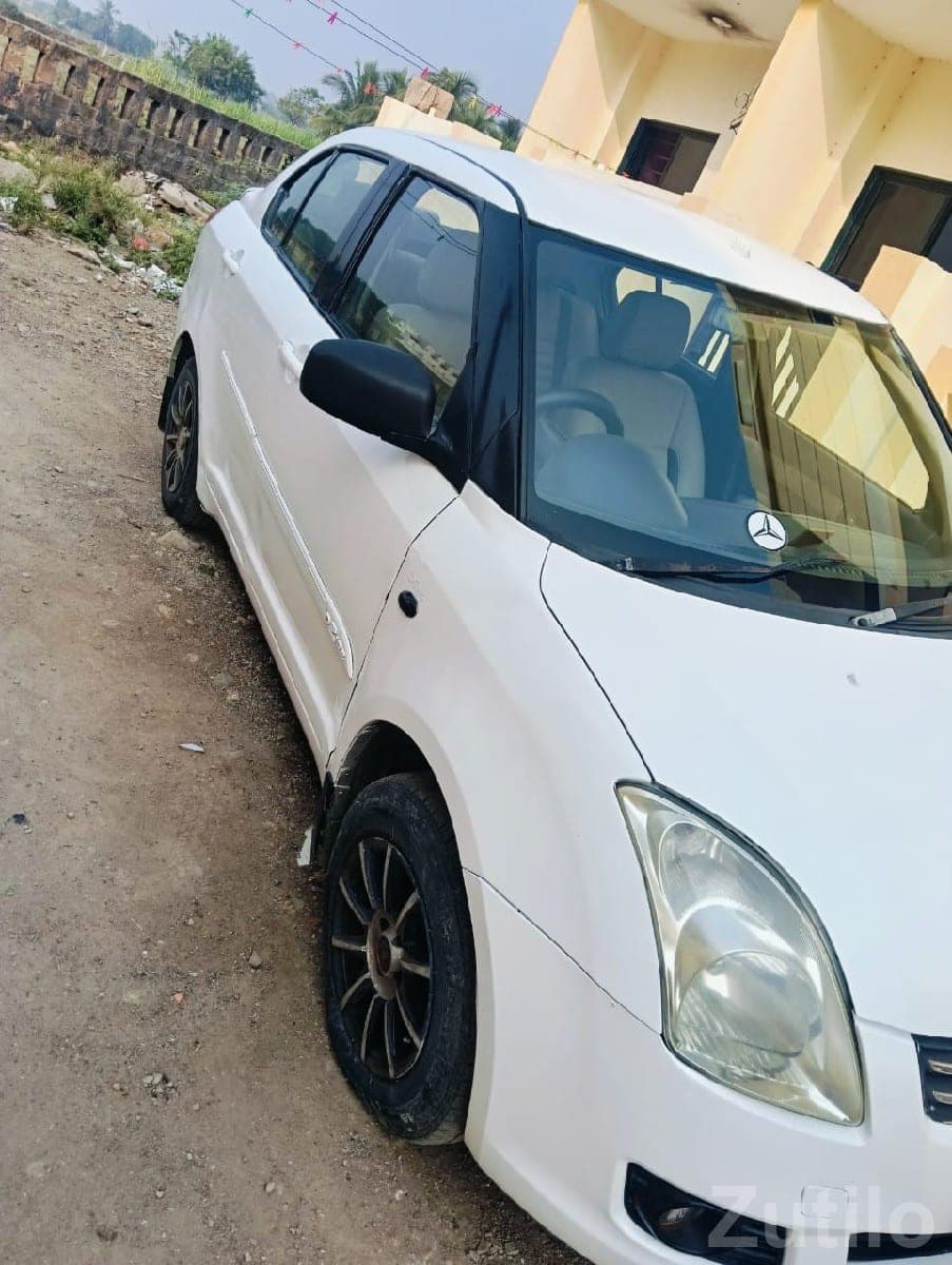 White Maruti Swift VDi Diesel Car