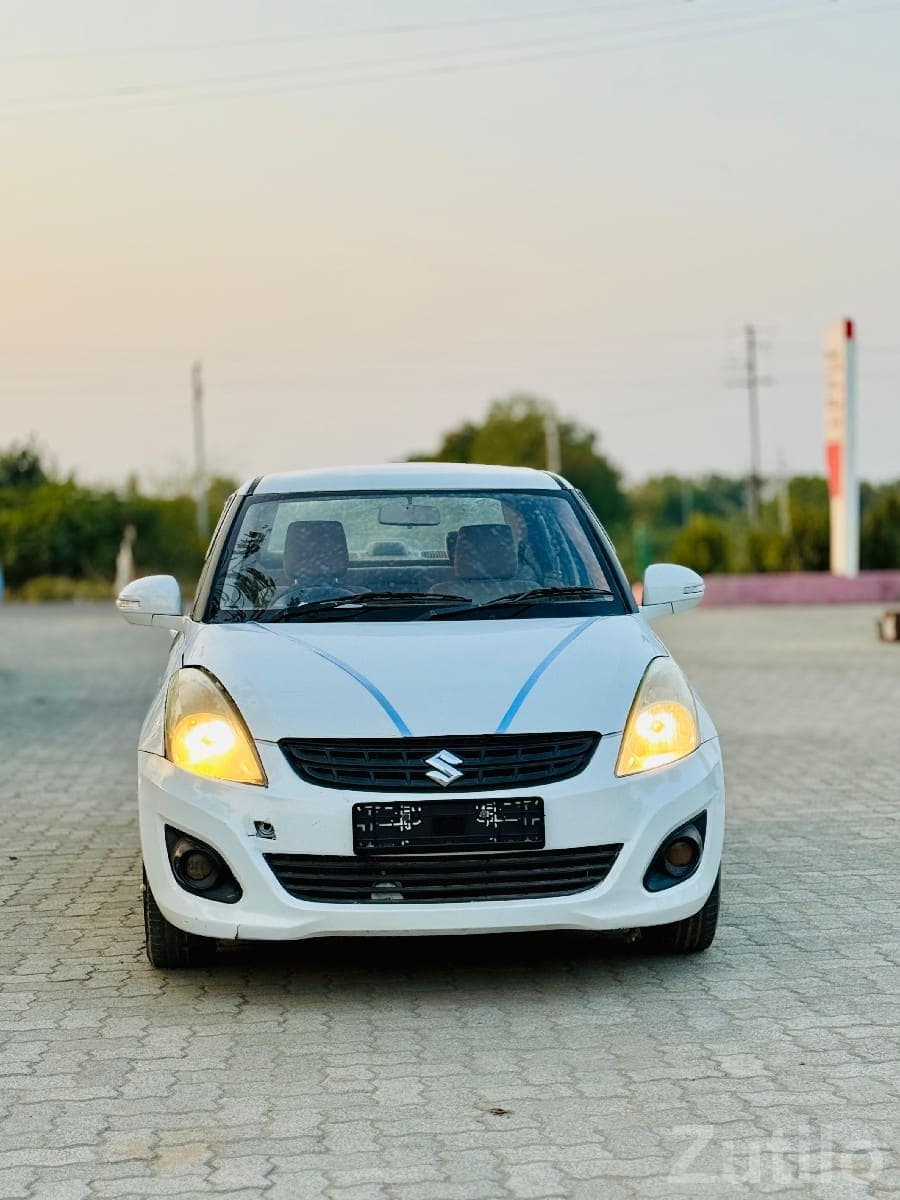 White Maruti Swift Dzire Sedan Car