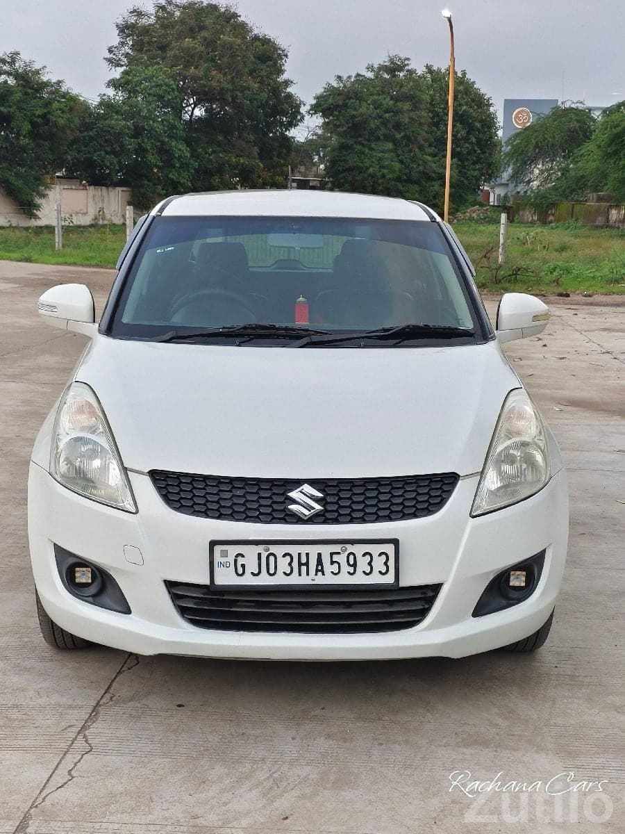White Maruti Swift VXI – Well Maintained