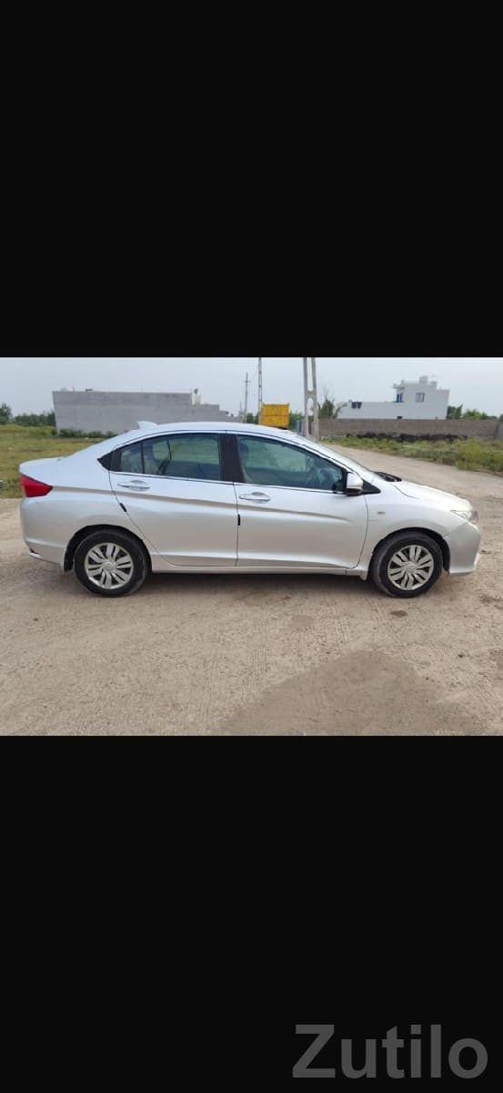 Silver Sedan Four Wheeler Car