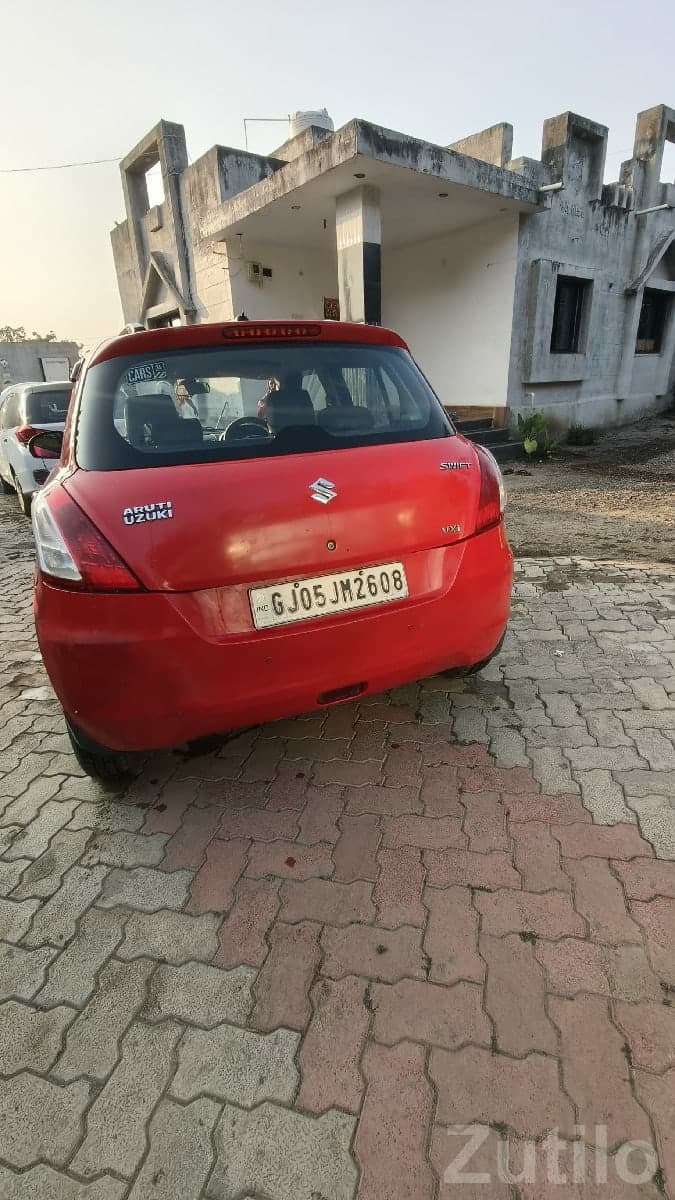 Red Maruti Swift VDI Diesel Hatchback