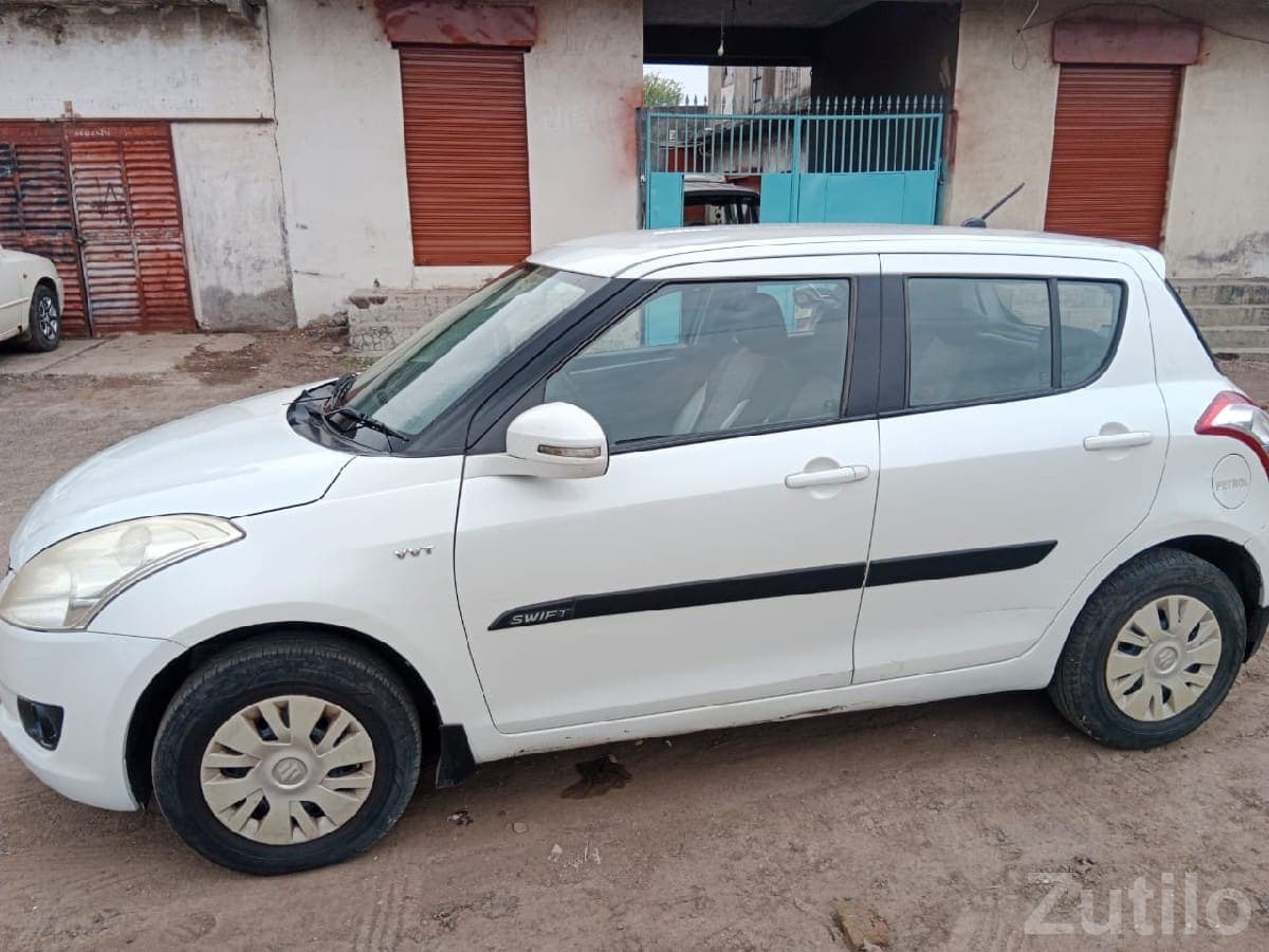 White Maruti Swift VDI Diesel Hatchback White Maruti Swift VDI Diesel Hatchback