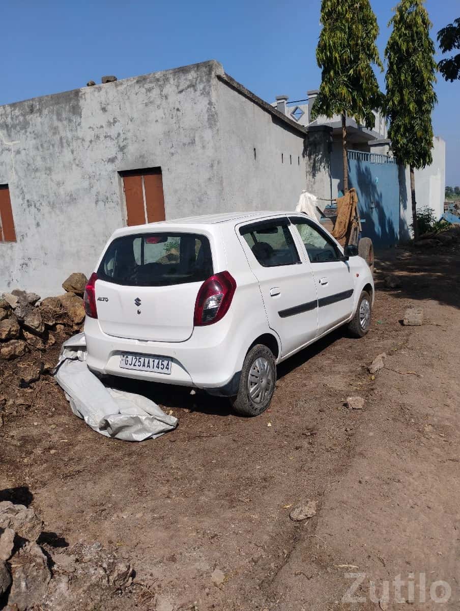 White Maruti Suzuki Alto Family Car White Maruti Suzuki Alto Family Car