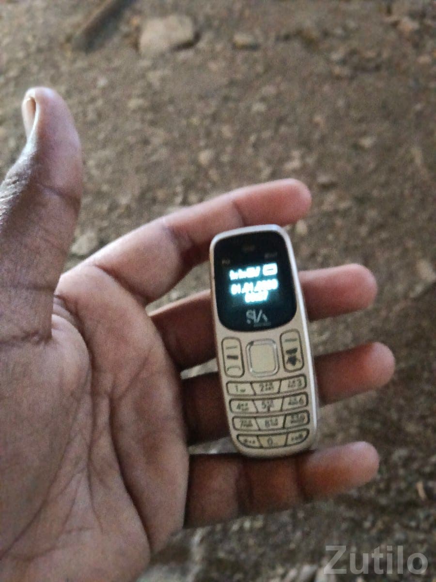 Mini Button Mobile Phone Compact Size Mini Button Mobile Phone Compact Size