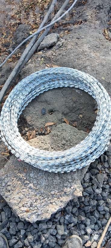 Barbed Wire Fencing Work and Wire Roll Barbed Wire Fencing Work and Wire Roll